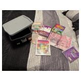 Tote of coloring books, puzzle books
