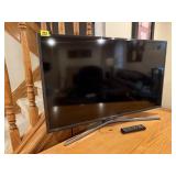 Samsung 40" television, remote control