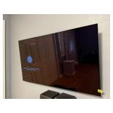 LG 55" television, remote control