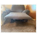 Tan reclining chair with micro cover
