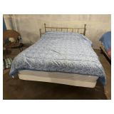 Queen size bed with bedding