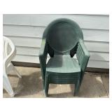 Set of green plastic patio chairs