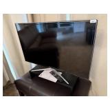 Samsung LED 40" television, riser, remote, manual