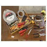Assorted hand tools, pliers, duct tape, sockets