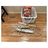 Tote of power cords, surge protectors