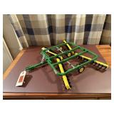 John Deere toy folding wing disc
