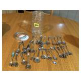 Jar of souvenir spoons