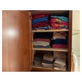 Contents of linen closet, beach, bath, hand towels