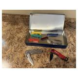Tin of pocket knives, swiss army knife