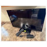 Insignia 24" television, remote