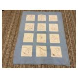 Embroidered baby quilt