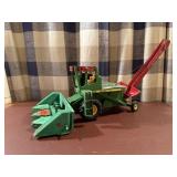 Fabricated John Deere combine toy