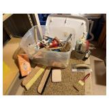 Tote of paint supplies, brushes, rollers