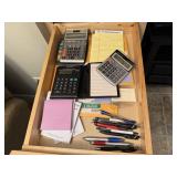 Office supplies, calculators, notepads, pens