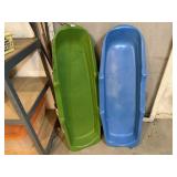 Plastic snow sleds (2)