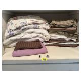 Shelf of bedding, sheets, pillowcases