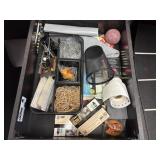 Drawer of miscellaneous office supplies.