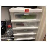 Plastic storage tote with many miscellaneous