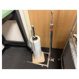 Roll of plastic with stand