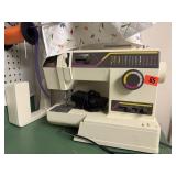 Singer sewing machine with cover