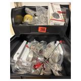 Bins full of bartending items/tools