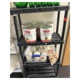 Black plastic shelf only. Contents not included