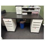 Two desks with drawers.