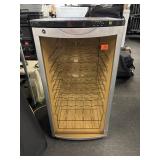 Haier wine cooler 4 cubic foot in size. 20 x 21 x