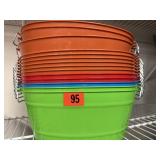 Stack of metal buckets with handles