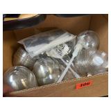 Flat of plastic lids and bottle pump