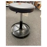 Black stool on wheels