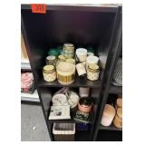 Black stand with candles, baskets etc