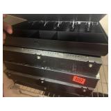 Stack of cash register drawers
