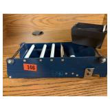 Metal tape dispenser