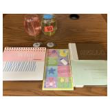 Notepad, candles, book