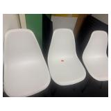 3 white office chairs
