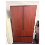 Wooden office cabinet with drawers.