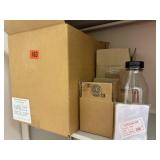 Box of plastic bottles with plastic bags