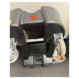 Plastic tote on wheels. Missing 1 wheel