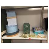 Lot of cardboard boxes, signs, letter cutouts.