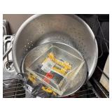 Large and small stainless steel colanders, with