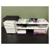 Shelf, drawers, miscellaneous office supplies.