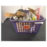 Basket of sandpaper and wire brushes,