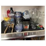 Everything on table. Glassware, plastic ware and