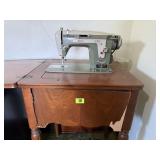 New Home sewing machine cabinet, machine, notions,