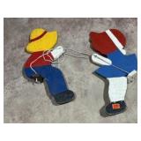 Swinging children yard art