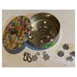 Biscuit tin of clip on earrings