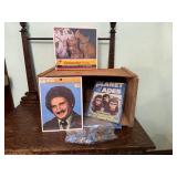 Wooden crate of vintage puzzles