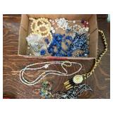 Jewelry beads, broken bits, crafted necklaces