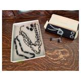 Black beaded necklaces, earrings